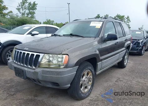 1999 Jeep Grand Cherokee Laredo from USA, damaged, VIN 1J4GW58NXXC736618